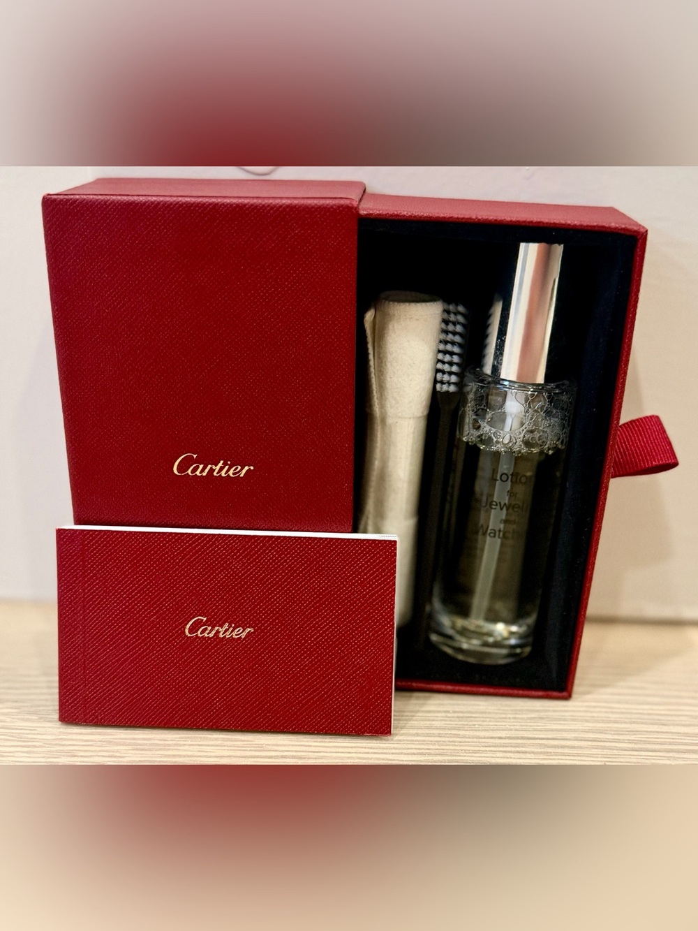 Cartier Red Jewelry Care Kit with Clear Bottle